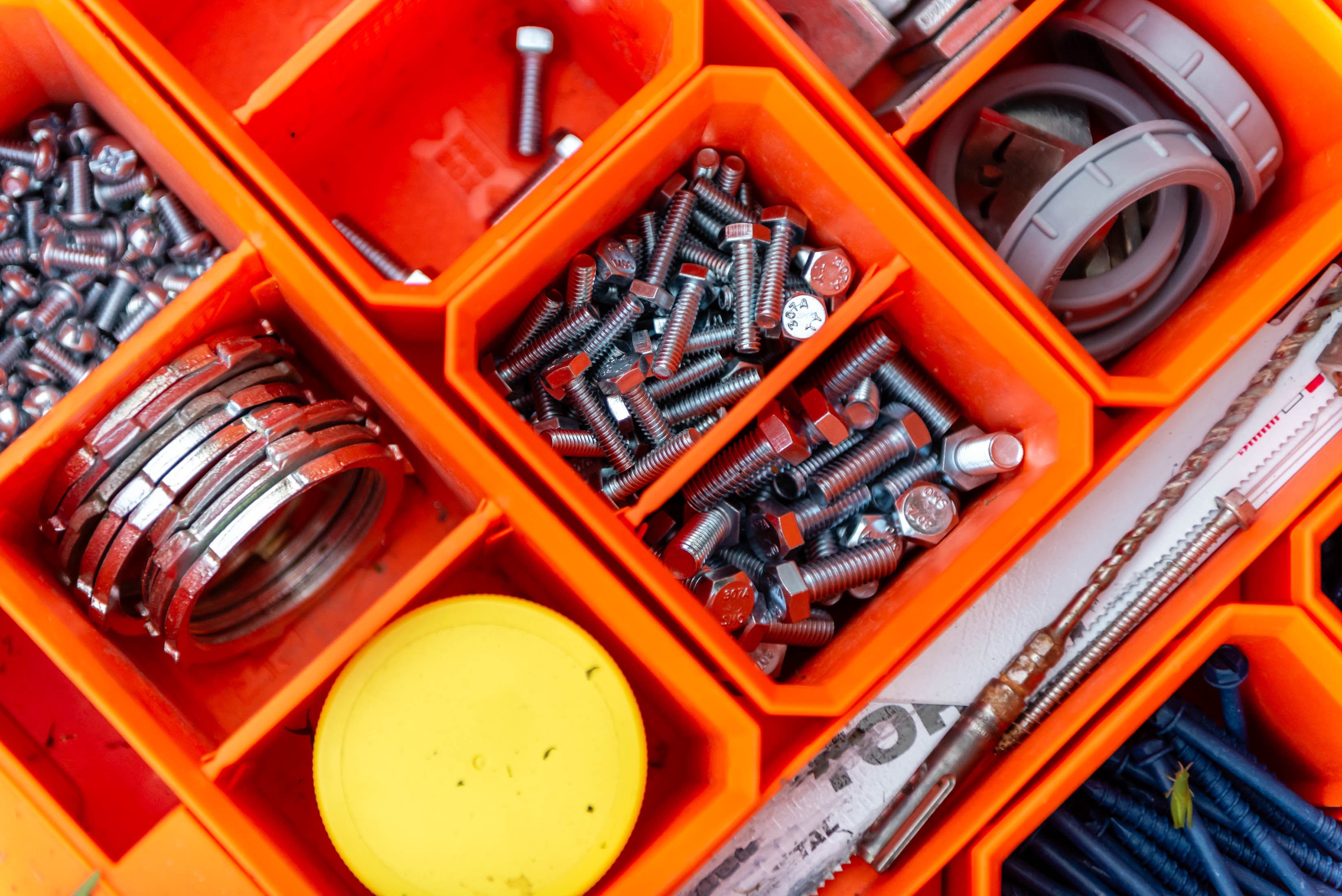 Wide view of organized conduit fittings and hardware — Casta Energy