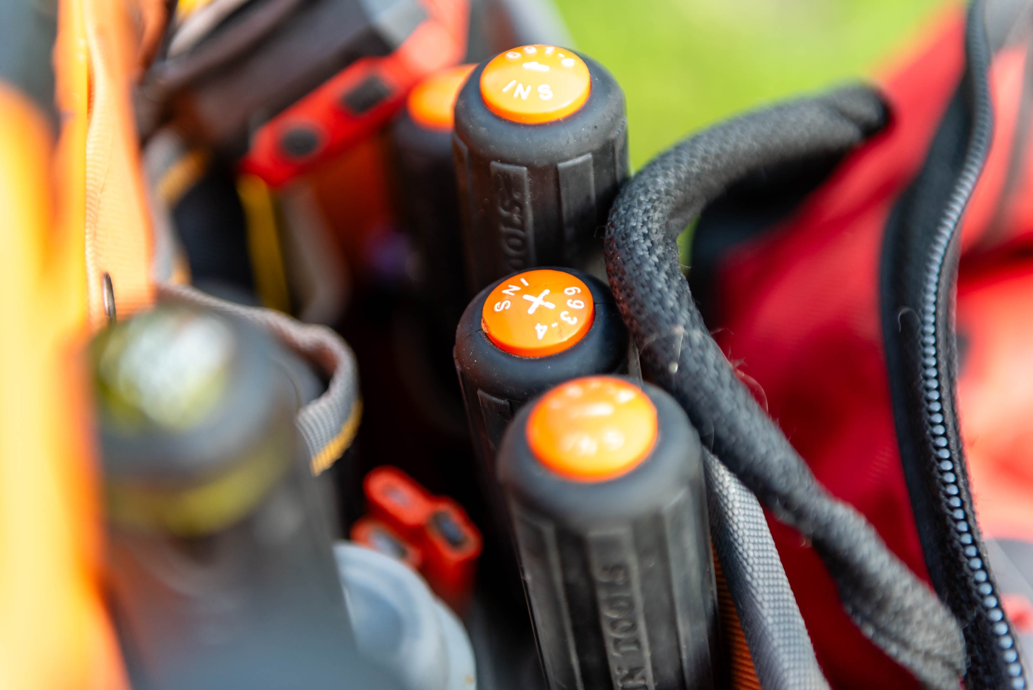 Klein Tools screwdrivers in tool belt — Casta Energy professional equipment